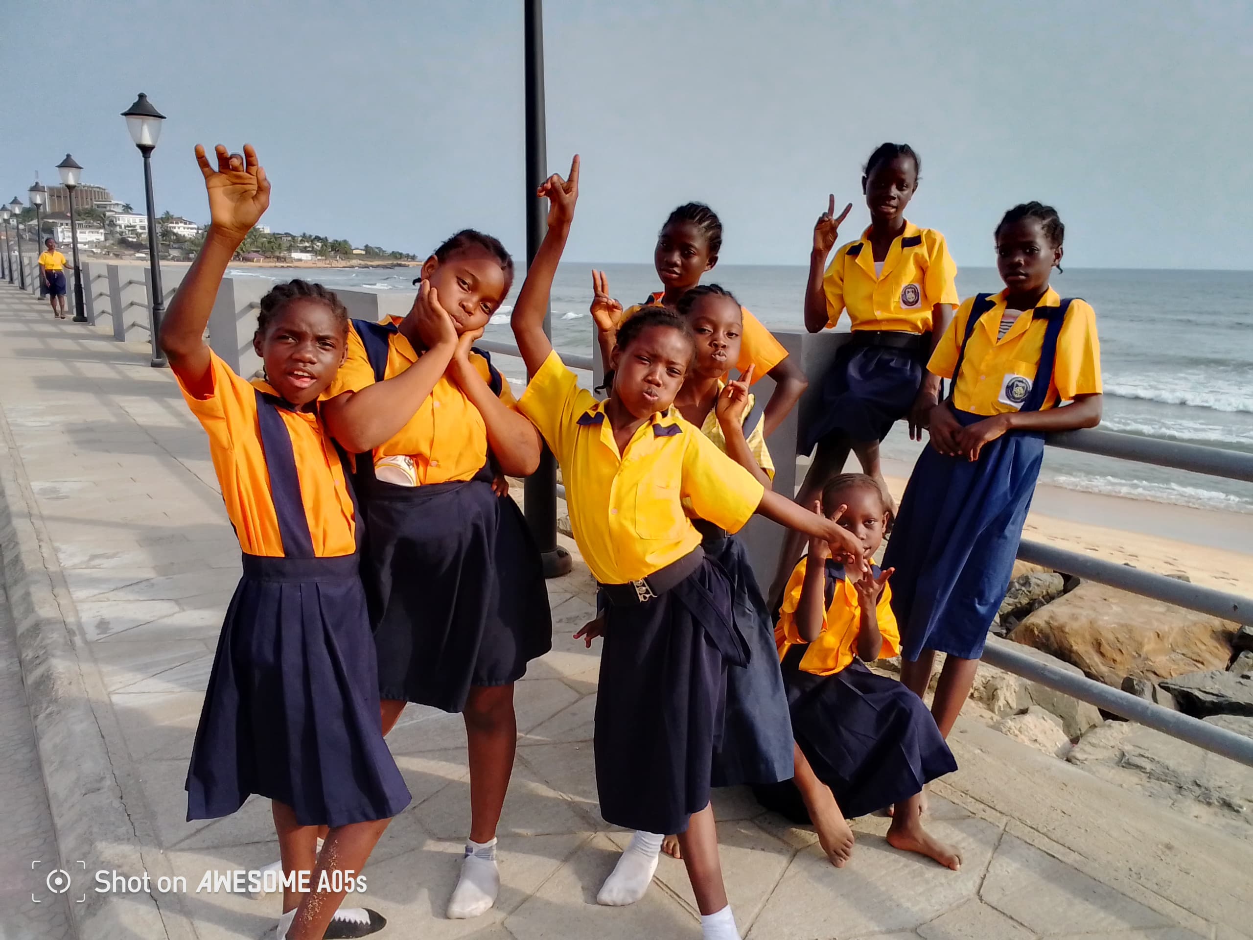 Students at Champion Academy receiving lunch in Paynesville, Liberia